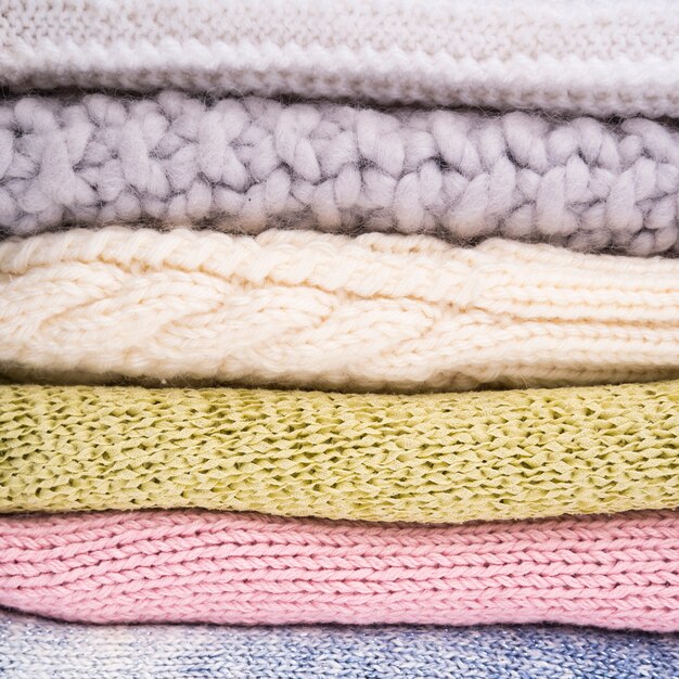 Stack of crocheted wool clothes