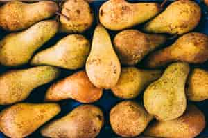 Free photo stack of delicious pears