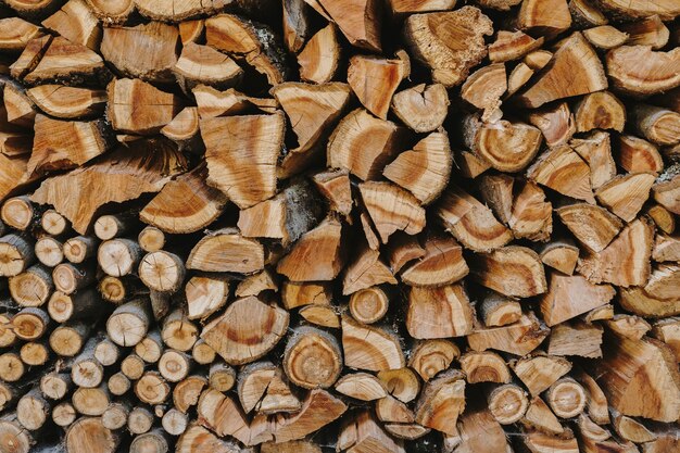 Stack of firewood textured background