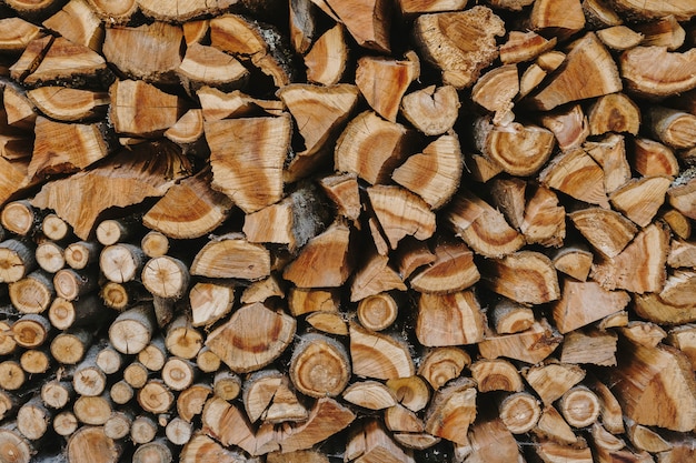 Stack of firewood textured background