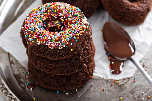 Stack of homemade baked chocolate donuts