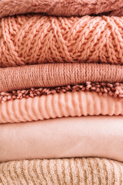 stack of knitted sweaters