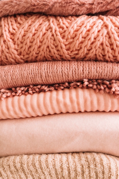 Free photo stack of knitted sweaters