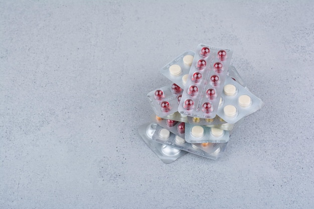 Stack of medical drugs on marble