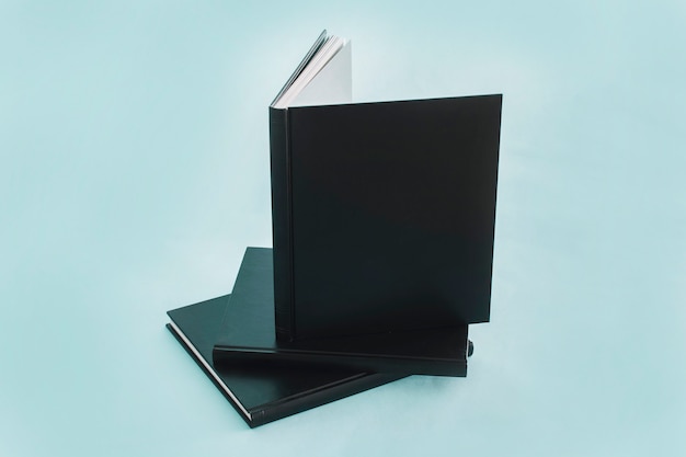 Stack of notebooks with black cover