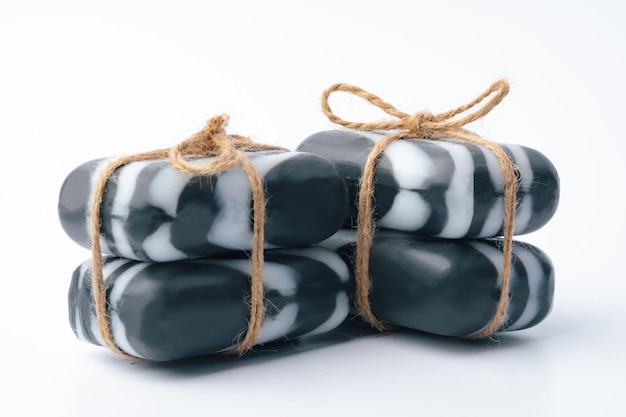 Stack of soap bars on white background