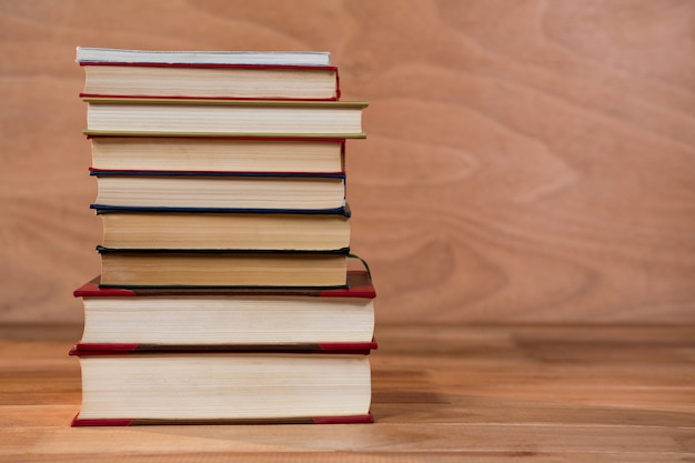 Stack of various books on a table