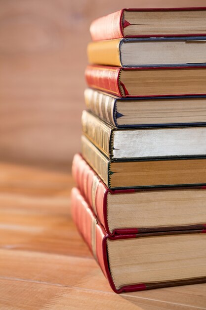 Stack of various books on a table