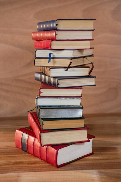 Stack of various books on a table