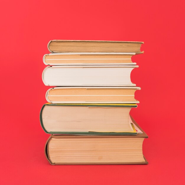 Stack of vintage hardcover books