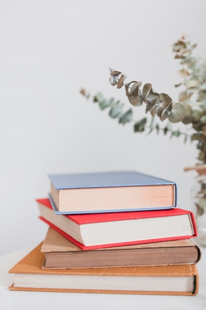 Stack of vintage hardcover books