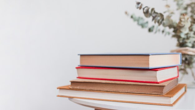 Stack of vintage hardcover books