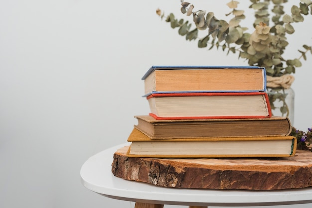 Stack of vintage hardcover books