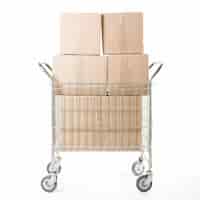 Free photo stacked of cardboard box on trolley against white background