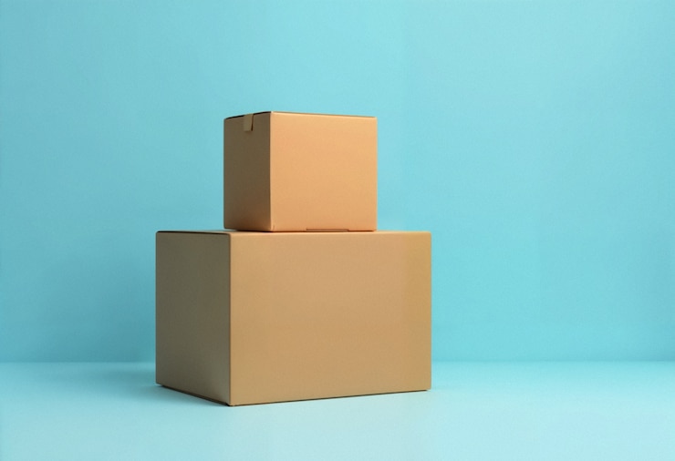 Free Photo stacked cardboard boxes