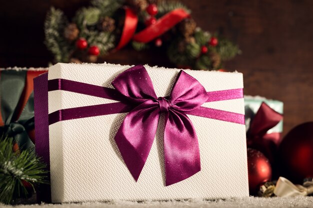 Stacked presents in white snow