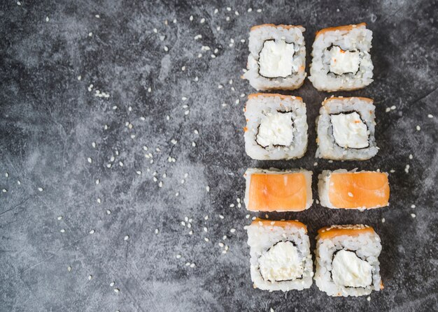 Stacked sushi with seeds and copy-space