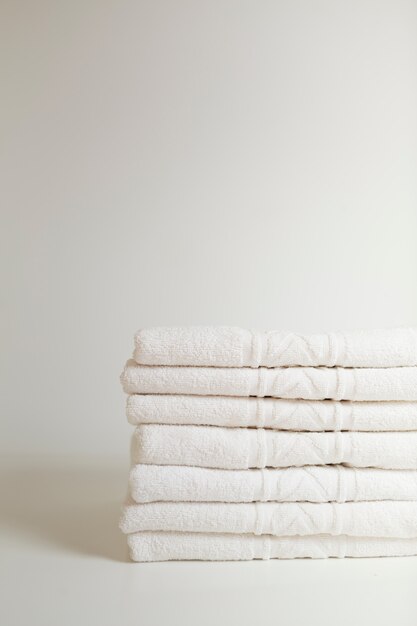 Stacked white towels