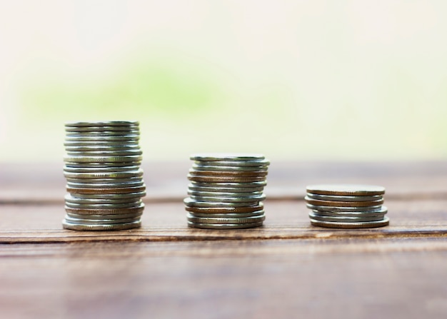 Stacks of savings coin on table