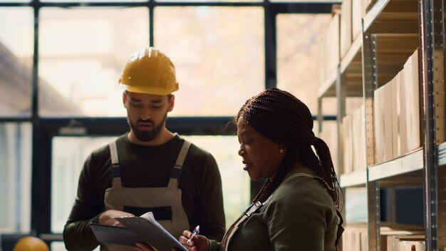 Staff members check warehouse inventory