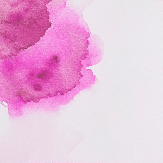 Stain of bright magenta watercolor