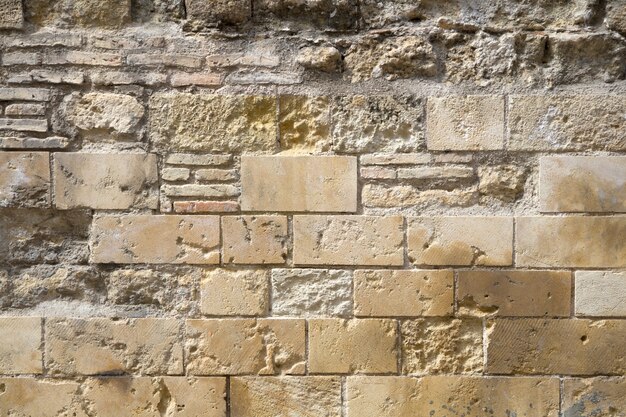 Stained brick blocks in wall