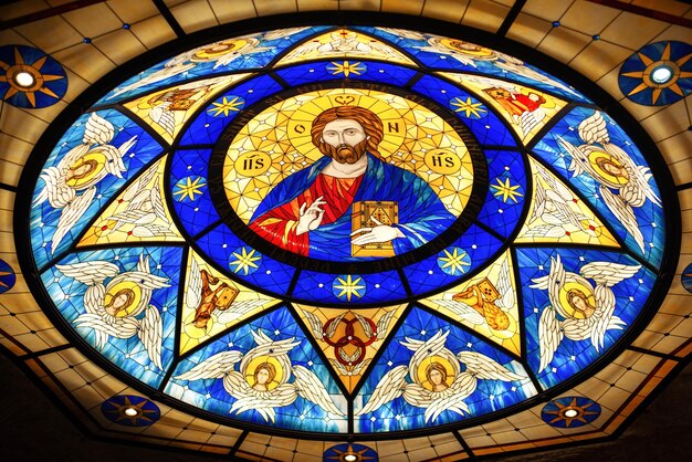 Stained glass roof in a church with the image of Jesus