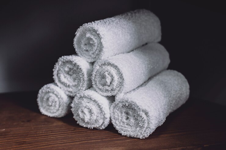 Free Photo staked white towels