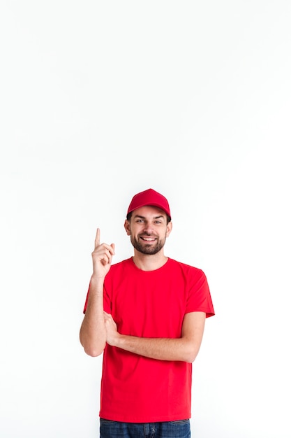 Standing courier man pointing his finger up