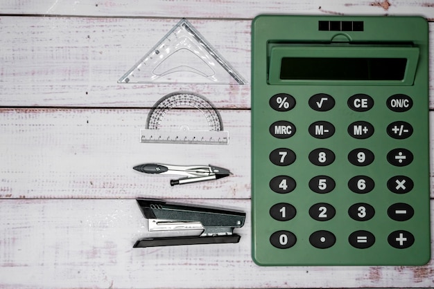 Free photo stapler, compass, rulers and calculator on boards