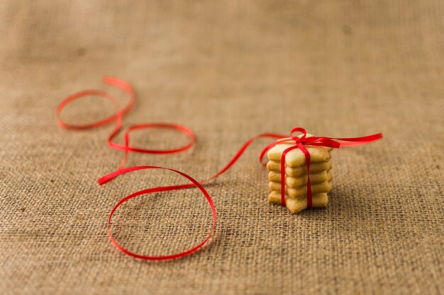 Star cookies with red ribbon