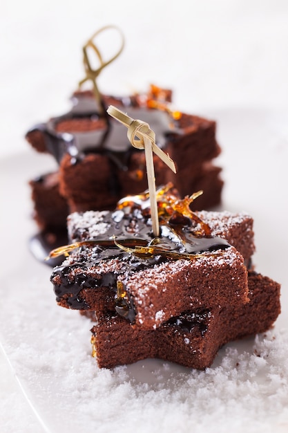 Star-shaped dessert with chocolate syrup