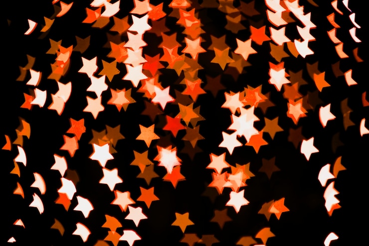 Free Photo star shaped neon lights background