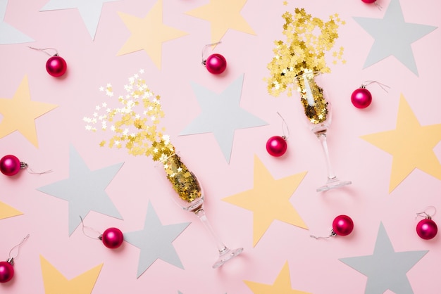 Star spangles scattered from glasses with baubles