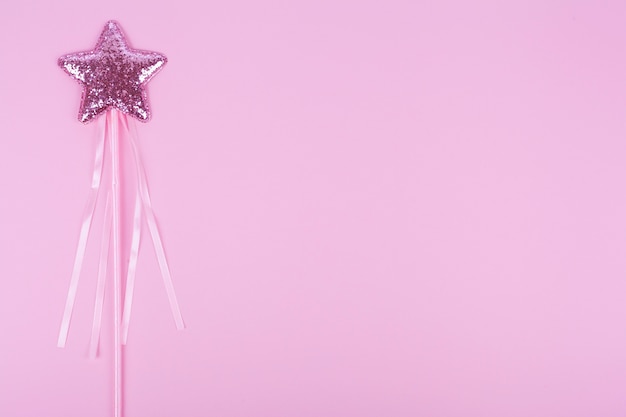 Star on stick with copy space violet background