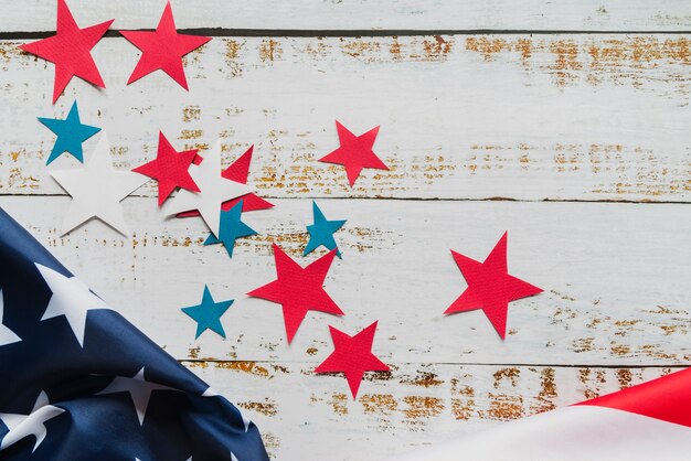 Stars and American flag on wooden background