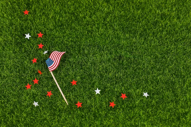 Free photo stars and usa flag on grass