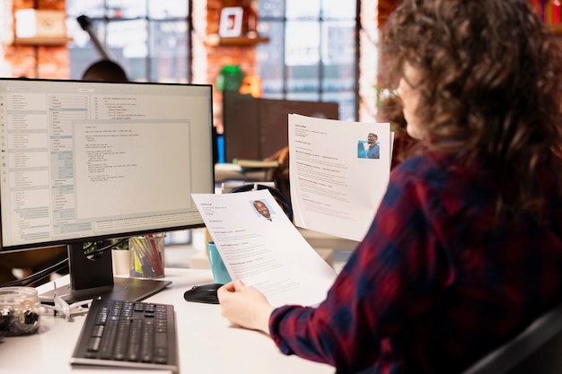 startup hr worker identifying right candidates for job opening reviewing resume