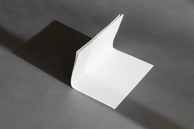 Stationery concept with folded paper sheet