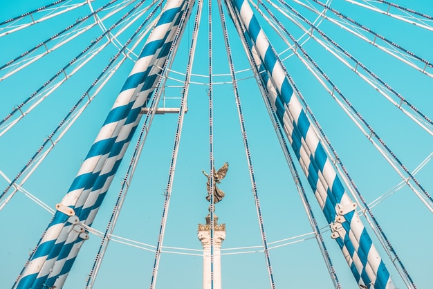 Statue on pedestal and blue sky