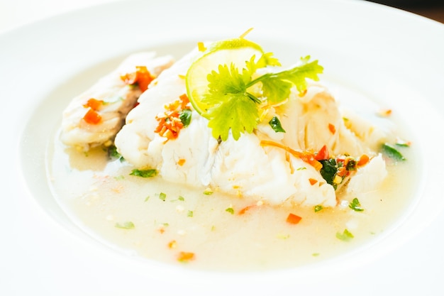 Steam fish fillet meat with lemon spicy sauce