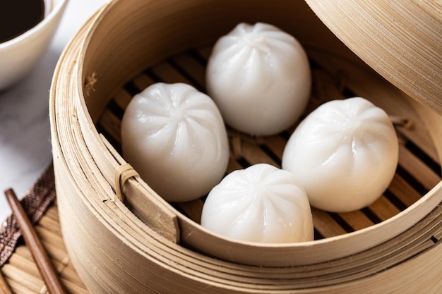 Free photo steamed dumplings on white marble background traditional oriental food