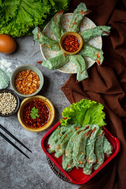 Steamed Shrimp Wontons Dim Sum with Raw Materials.