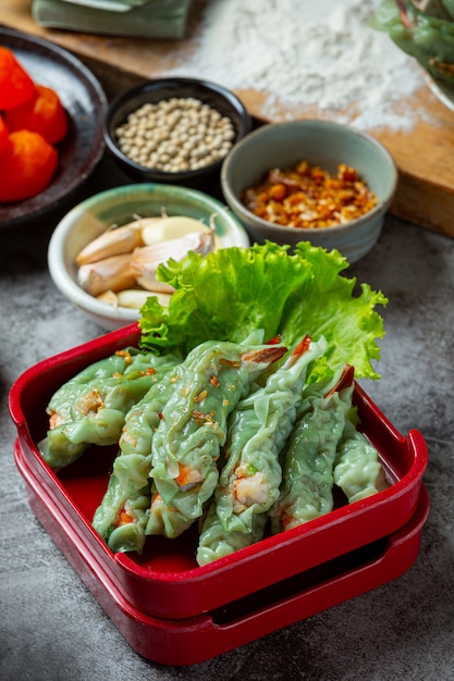 Steamed Shrimp Wontons Dim Sum with Raw Materials.