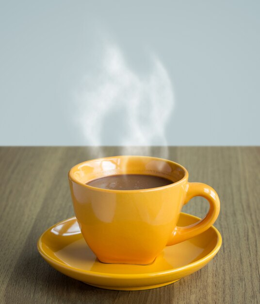 steaming coffee cup on table