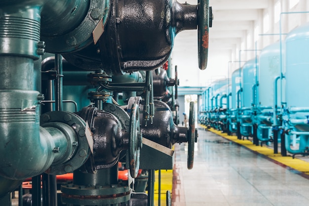 steel pipelines and cables in a plant