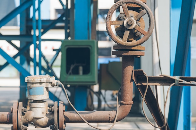 Free photo steel pipelines and cables in a plant