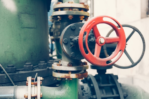 Free photo steel pipelines and cables in a plant