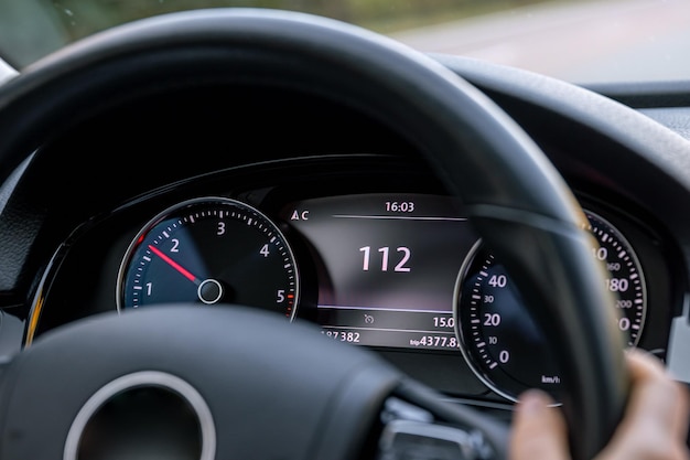 Free photo steering wheel in a car close up high speed driving on the road