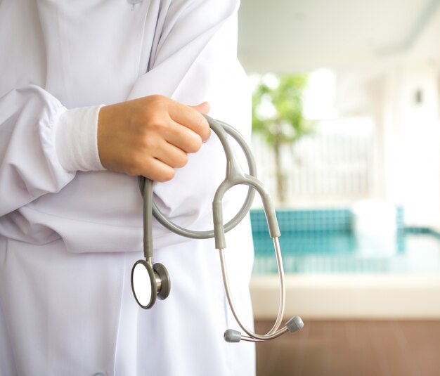 Stethoscope in the hands of a doctor